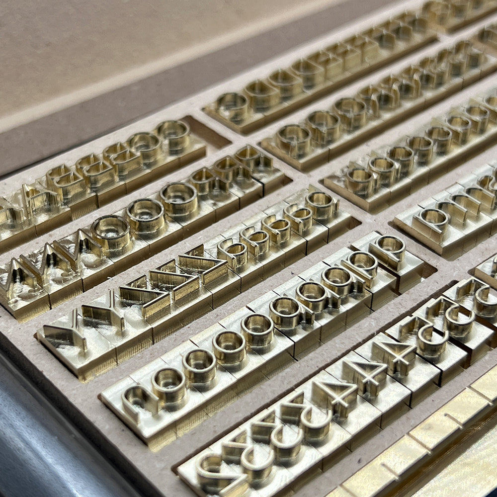 215-Piece Gotham 1/4″ Brass Letter Stamp Set