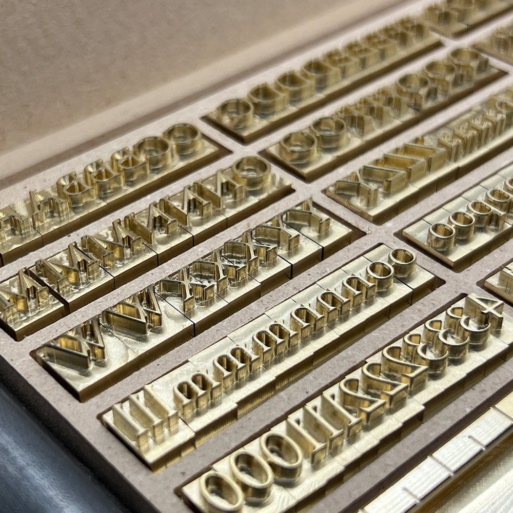 215-Piece Goudy 1/4″ Brass Letter Stamp Set