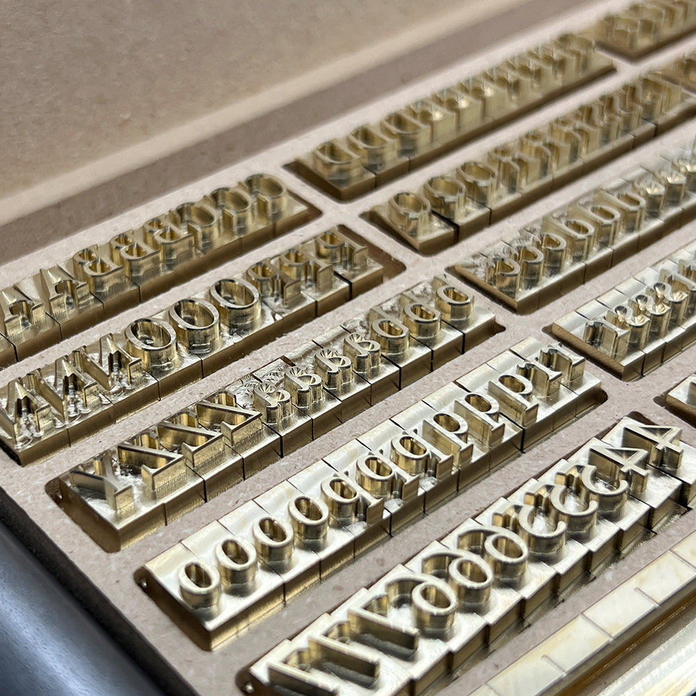 215-Piece Times Roman 1/4″ Brass Letter Stamp Set