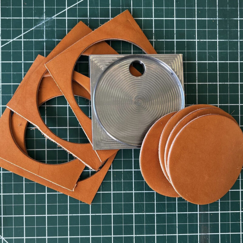 Steel Circle Leather Cutting Die with punched round leather disks and scraps